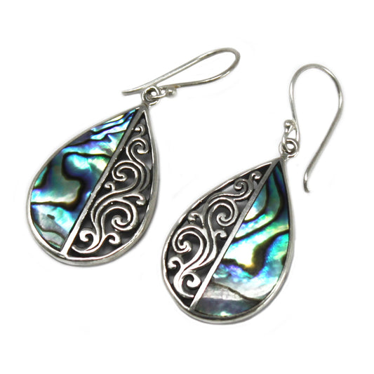 "Teardrop earrings with vertically split design: half abalone shell, half ornate silver swirl pattern, handcrafted in Bali."