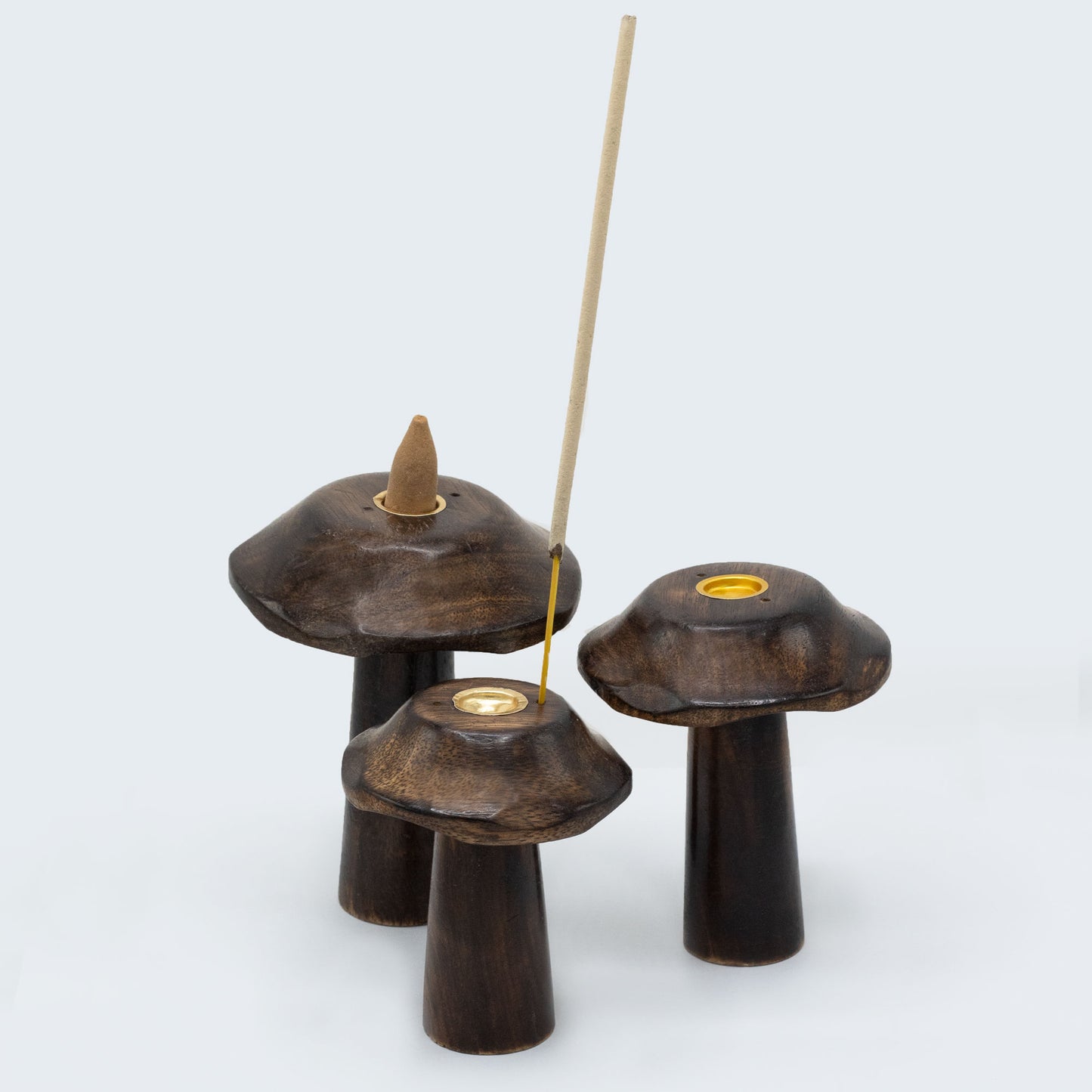 Set of 3 handcrafted mango wood flat mushroom incense holders with brass plates in 13cm, 12cm, and 11cm sizes for cone burning and natural décor.