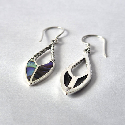 Close-up of 925 sterling silver and shell earrings crafted in Bali