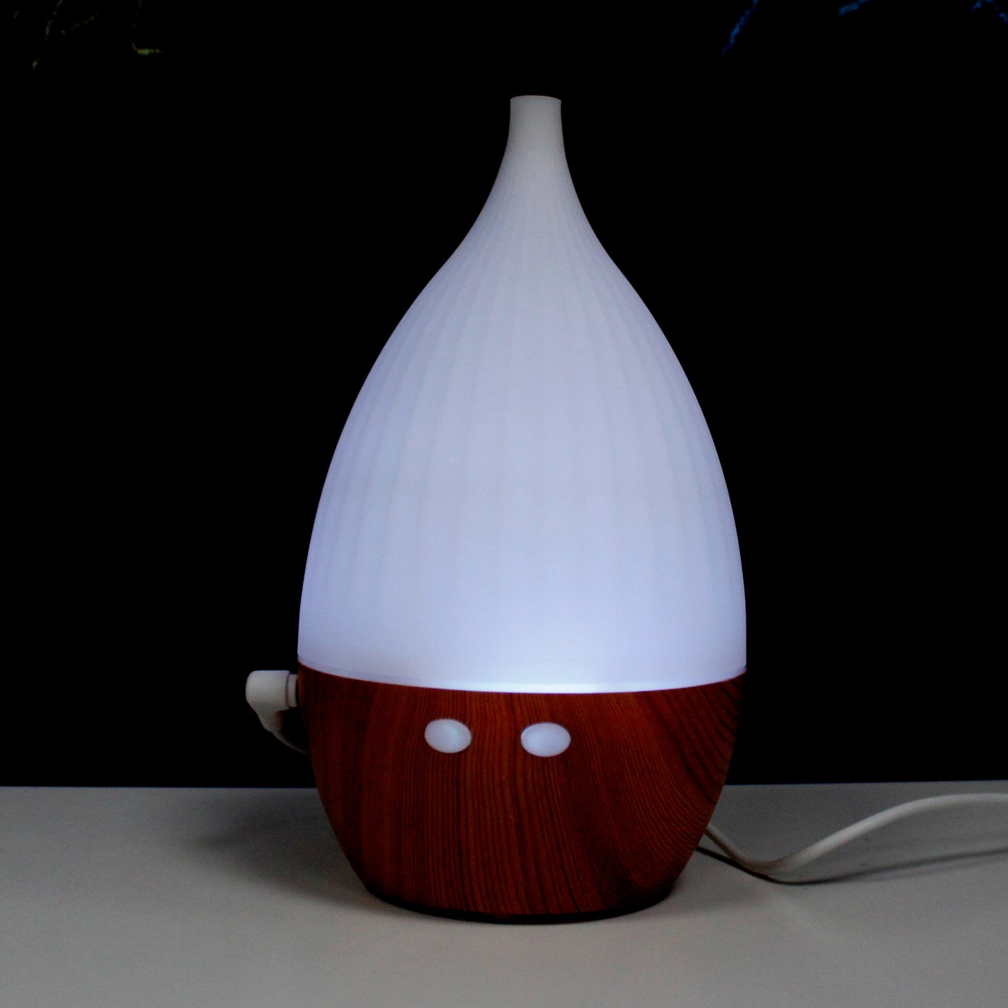 Milan USB aroma diffuser with colour-changing LED and minimalist design, ideal for compact spaces and everyday aromatherapy.