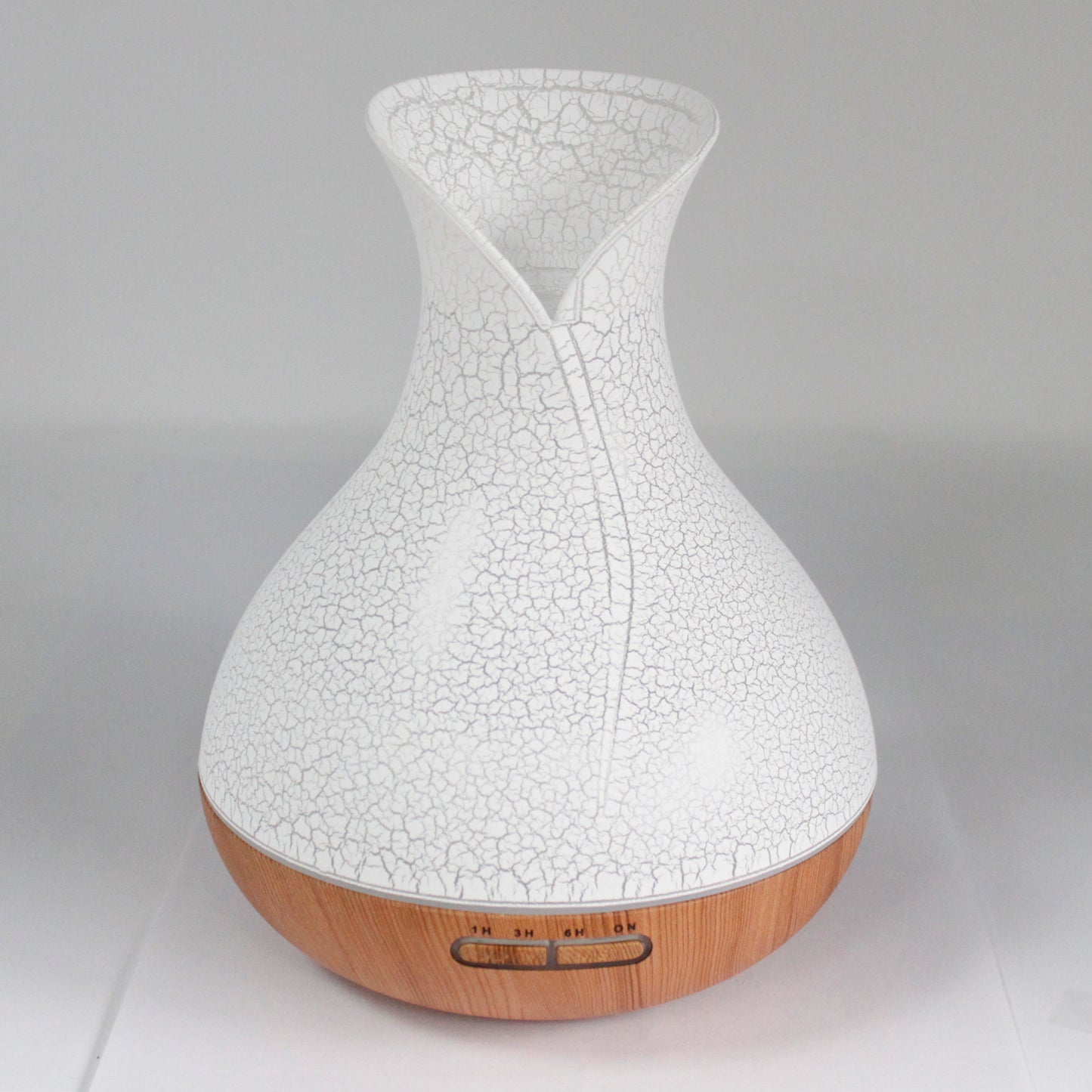 Palma shell-textured USB aroma diffuser with colour-changing light, ultrasonic mist, and timer for home aromatherapy and relaxation.