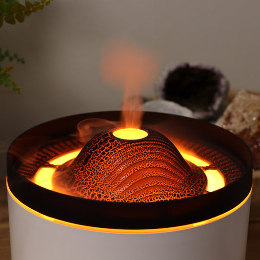 Large volcano-style plug-in aroma diffuser with twin mist streams, LED light display, and UK plug. Perfect for high-impact home fragrance.