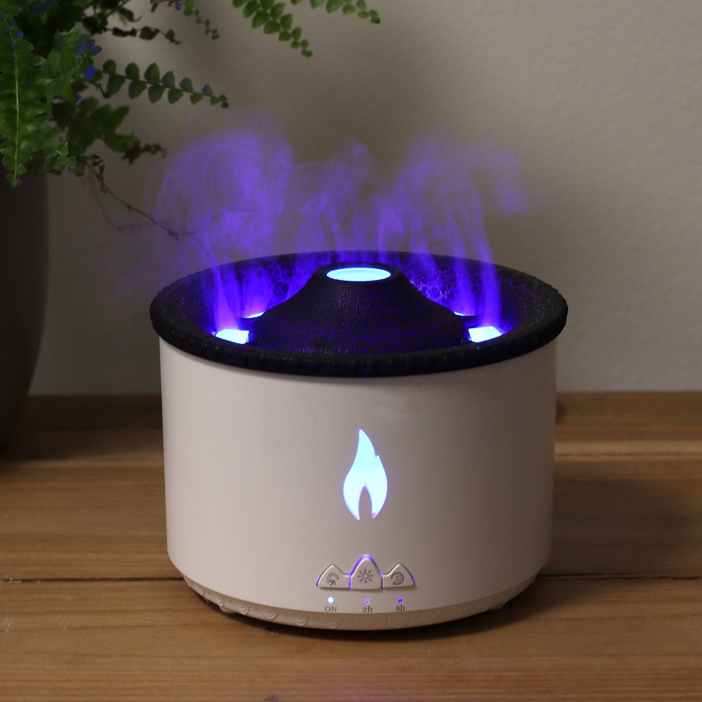 Medium volcano-style aroma diffuser with twin mist outlets, UK plug, and LED light for glowing aromatherapy in medium-sized rooms.