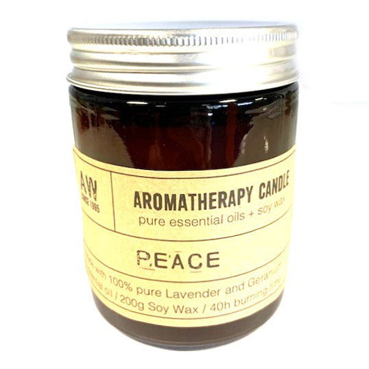 Peace soy wax aromatherapy candle with lavender and geranium essential oils in amber jar
