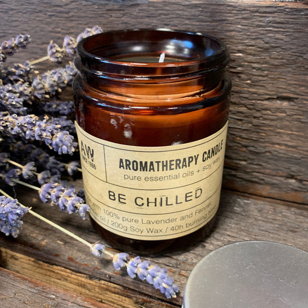 Be Chilled soy wax aromatherapy candle with lavender and fennel essential oils in amber jar