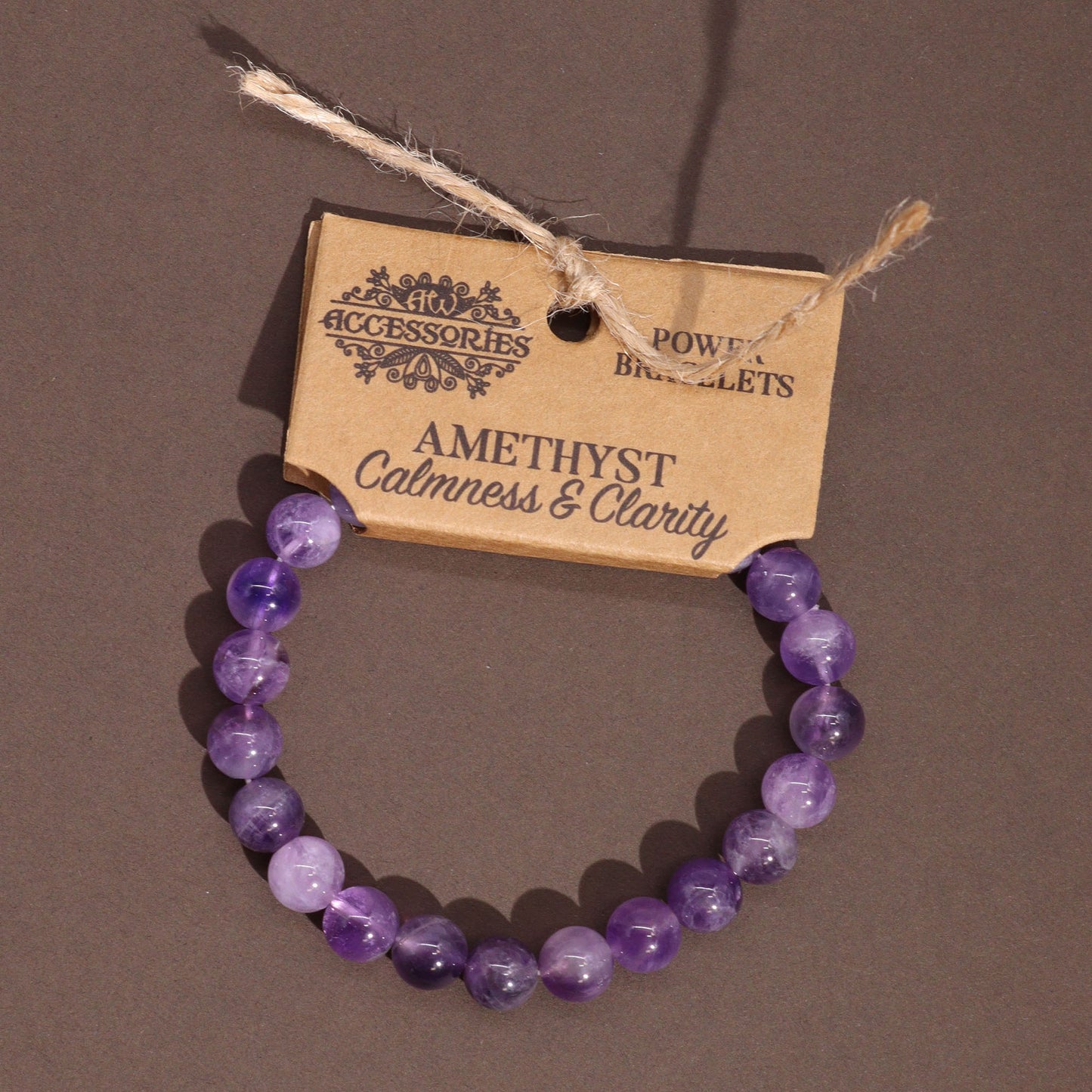 Amethyst power bracelet with soothing purple 8mm beads, symbolising calmness, mental clarity, and emotional balance.