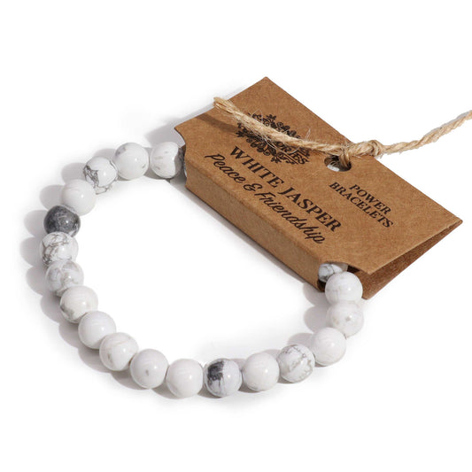 White Jasper power bracelet for peace and friendship. 8mm soft-toned beads support calm, compassion, and emotional connection. One size fits all.