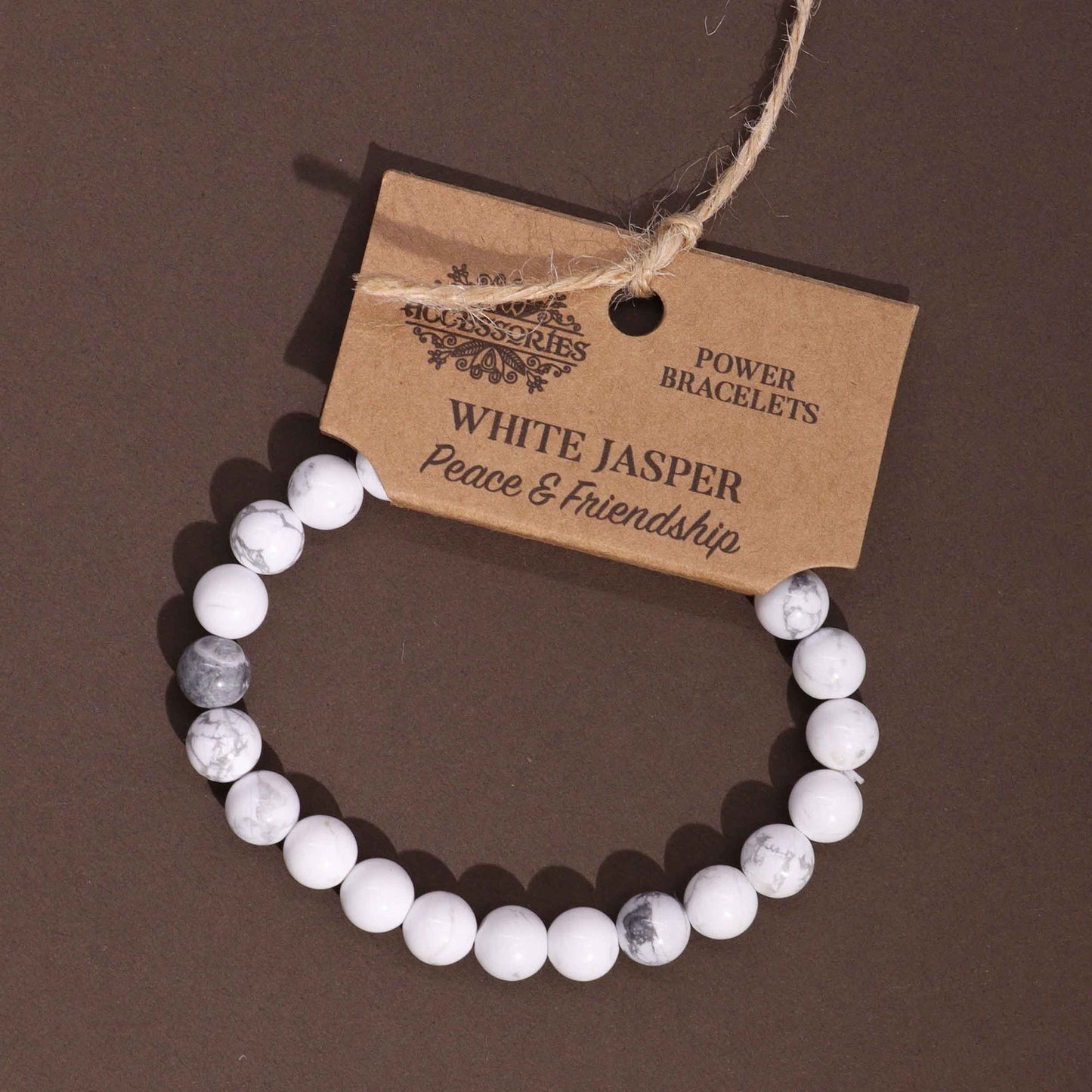 White Jasper power bracelet for peace and friendship. 8mm soft-toned beads support calm, compassion, and emotional connection. One size fits all.