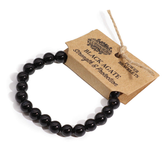 Black Agate power bracelet with smooth 8mm dark beads, symbolising strength, grounding, and protective energy.