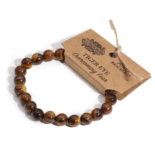 Tiger’s Eye power bracelet with golden-brown 8mm beads, symbolising courage, protection, and overcoming fear.
