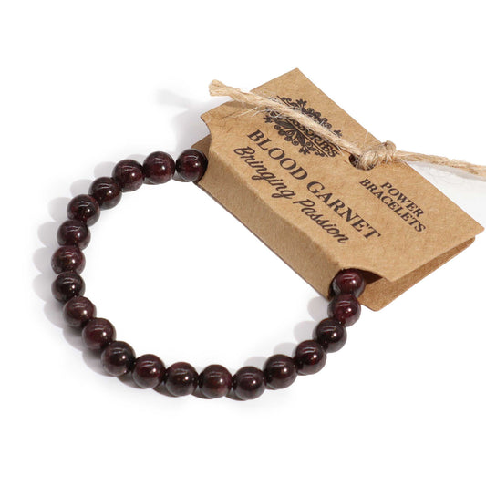Blood Garnet power bracelet with deep red 8mm beads, symbolising passion, vitality, and motivation.