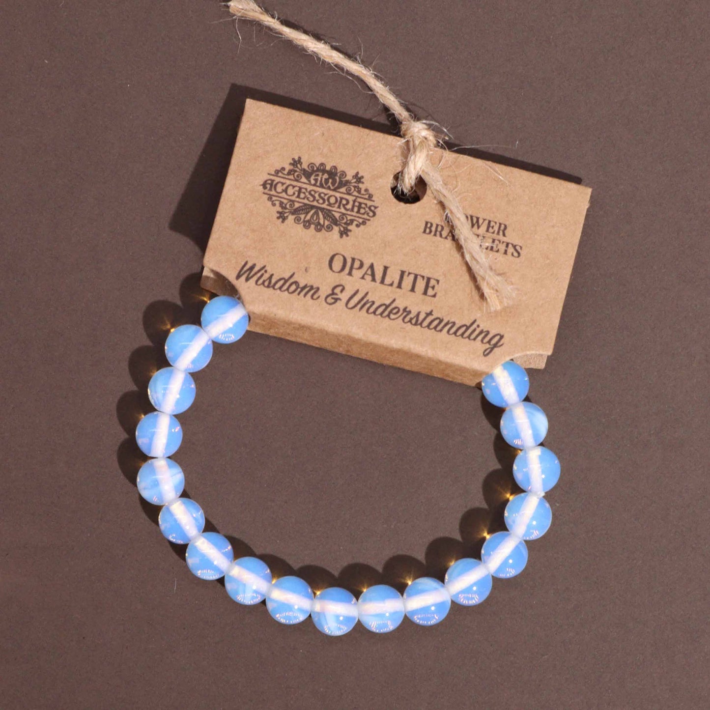 Opalite power bracelet with glowing 8mm beads, symbolising wisdom, inner understanding, and spiritual clarity.