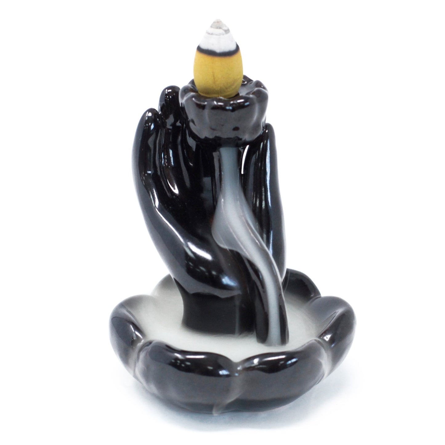 Hand and lotus flower backflow incense burner with sacred design and flowing smoke. Perfect for spiritual or meditative spaces.