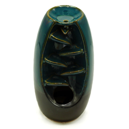 Serene oval-shaped backflow incense burner with smoke waterfall effect and ceramic finish for meditation or spiritual décor.