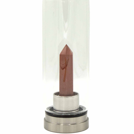 Crystal infused glass bottle with red jasper obelisk, stainless steel lid and base, neoprene sleeve, and gift box. 500ml BPA-free for grounding and vitality.