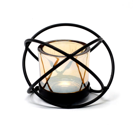 Orb-shaped iron candle holder with amber glass votive – single tealight design