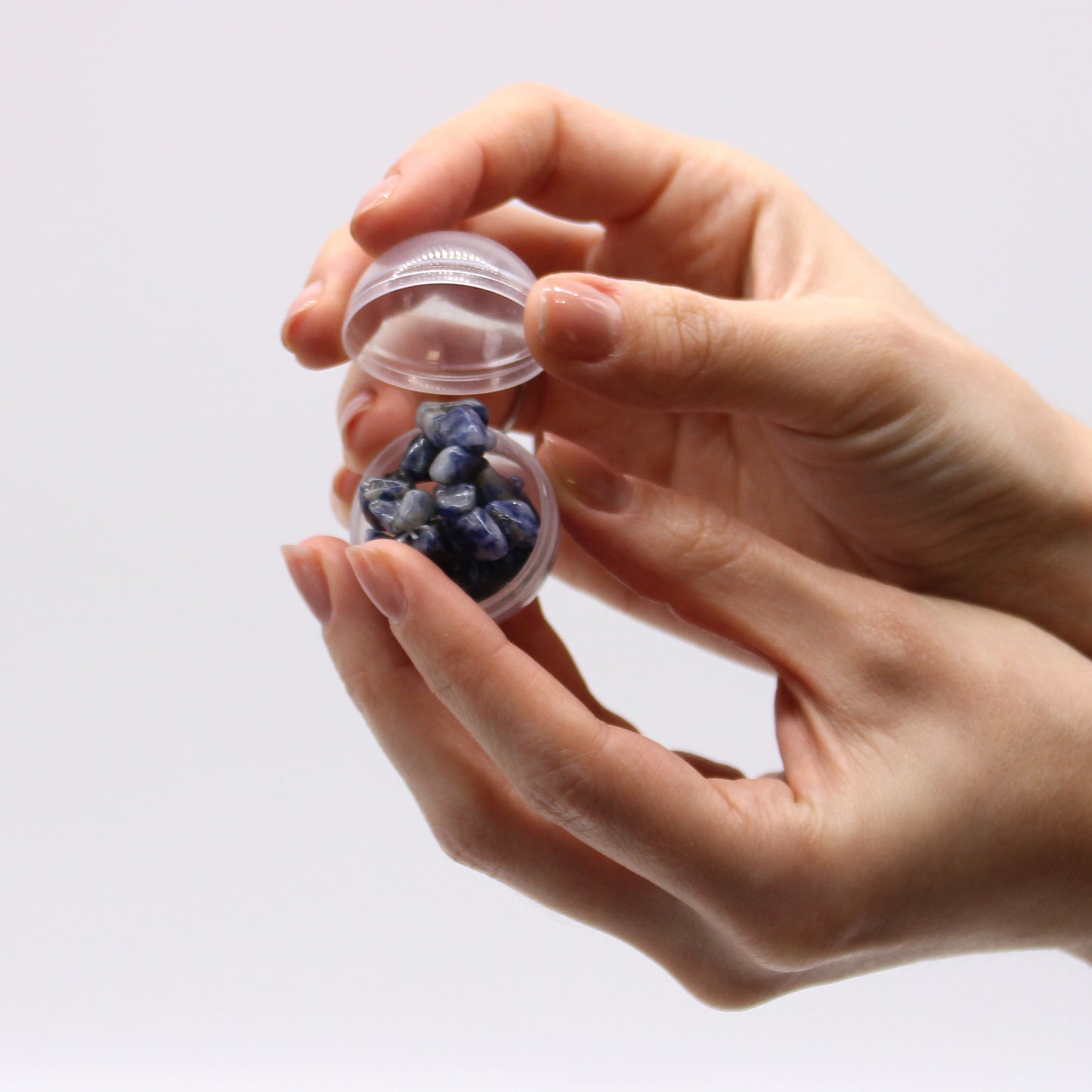 Sodalite gemstone bracelet bath bomb with sandalwood scent, handcrafted and rich in calming aromatherapy.