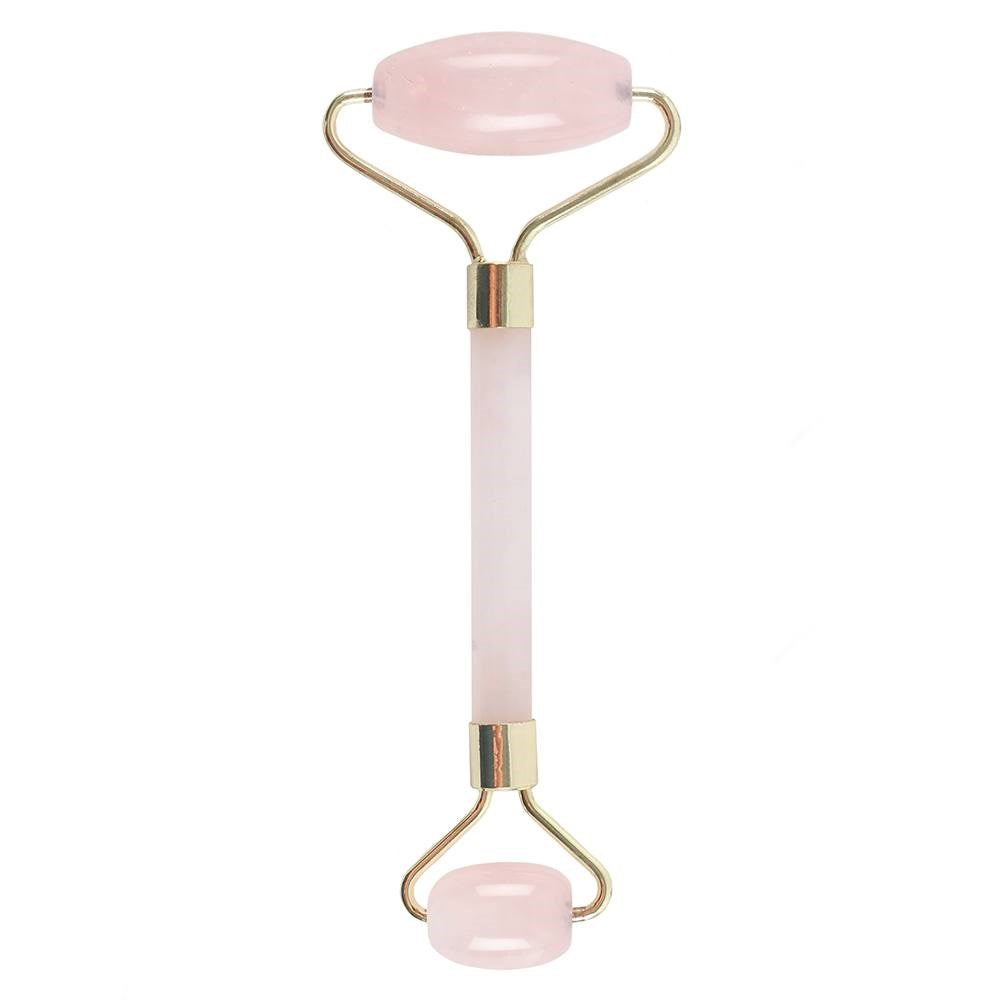Rose Quartz crystal face roller with smooth finish for skincare, love, and self-care rituals.