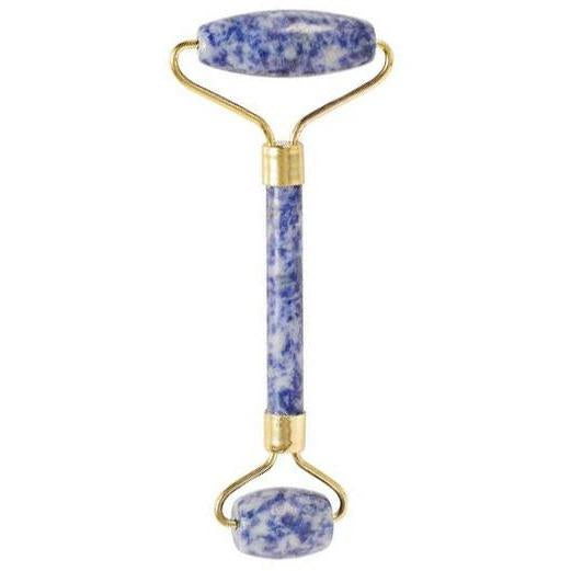 Sodalite crystal face roller with calming blue stone for skin clarity and facial massage.