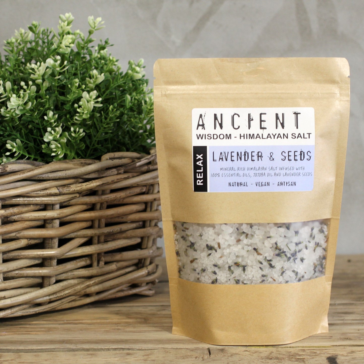 Himalayan Bath Salt Relax blend with lavender essential oil, jojoba, and dried lavender seeds in a 500g pouch.