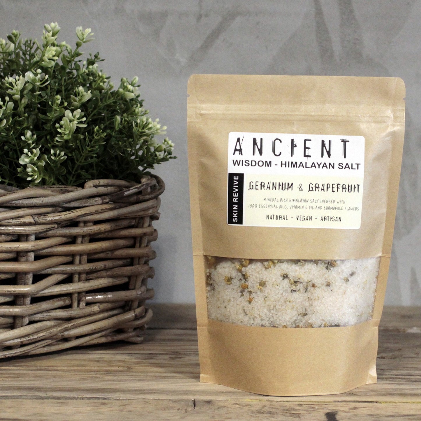 Himalayan Bath Salt Skin Revive blend with geranium, grapefruit, vitamin E oil, and chamomile flowers in a 500g pouch.