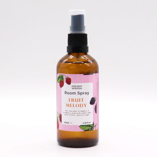 Amber bottle of Fruity Melody room spray – 100ml, with berry fragrance notes and natural ingredients.