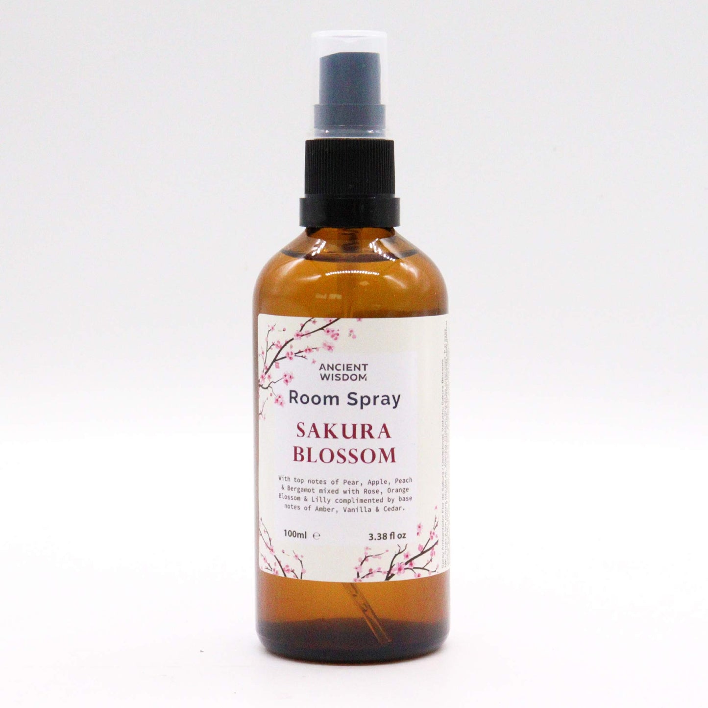Amber bottle of Sakura Essence room spray – 100ml, with cherry blossom-inspired floral and fruity fragrance.