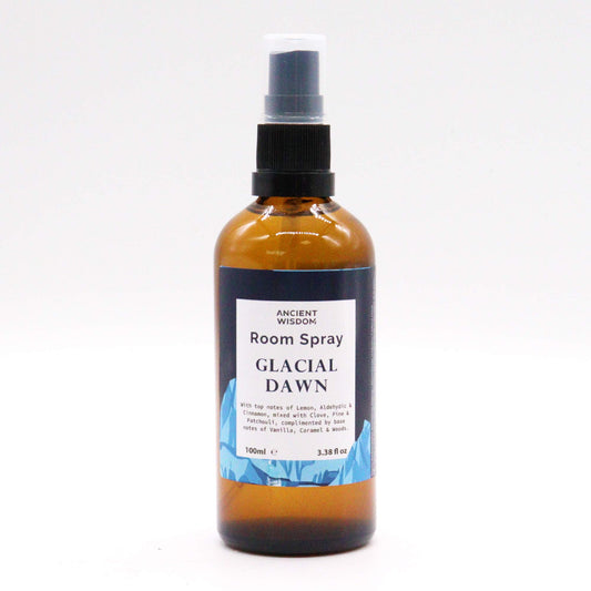 Amber glass bottle of Glacial Dawn room spray – 100ml, featuring a citrusy, spicy, and woody aroma blend.