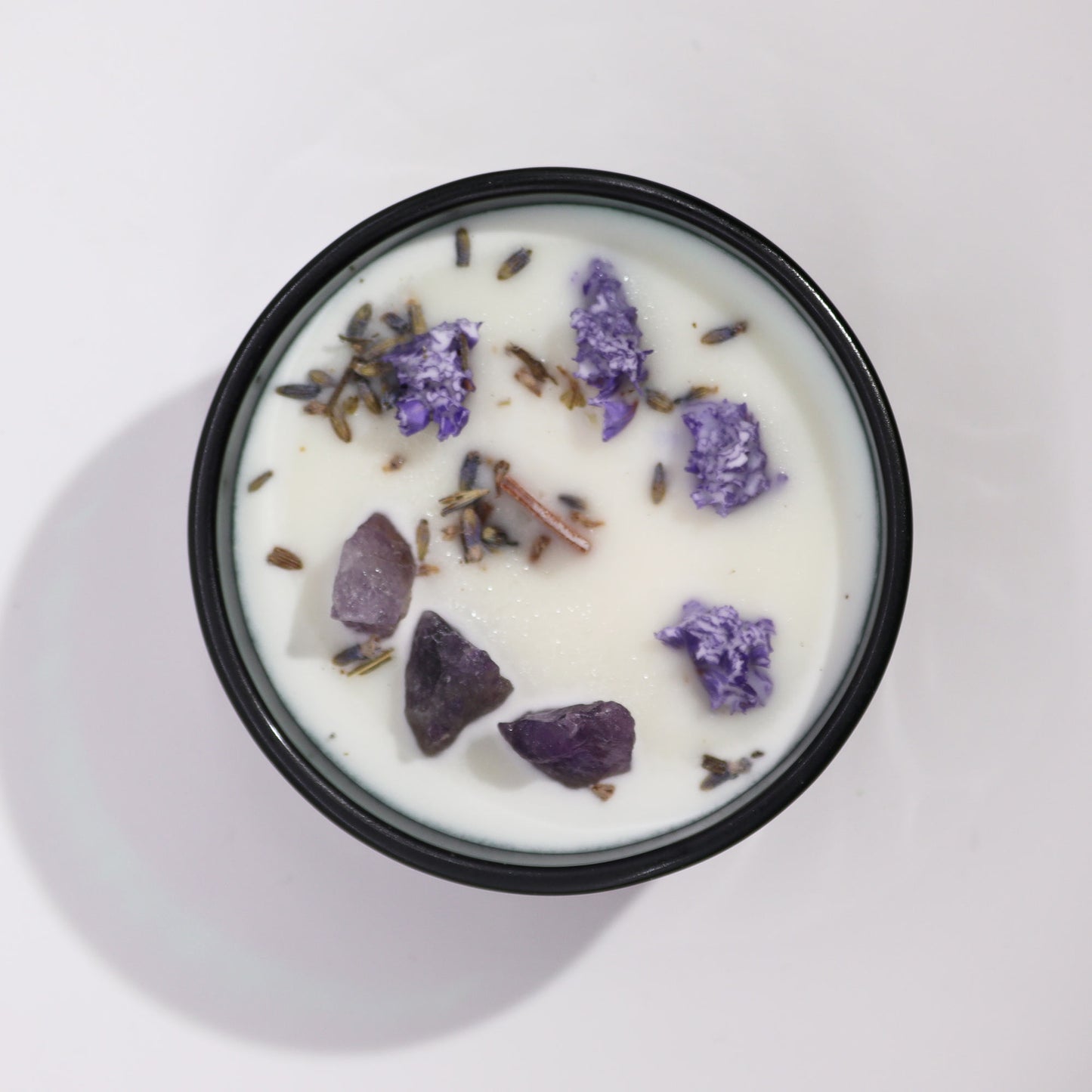 Hop Hare The Moon crystal candle with amethyst, lavender flowers, and tarot card in dark green jar