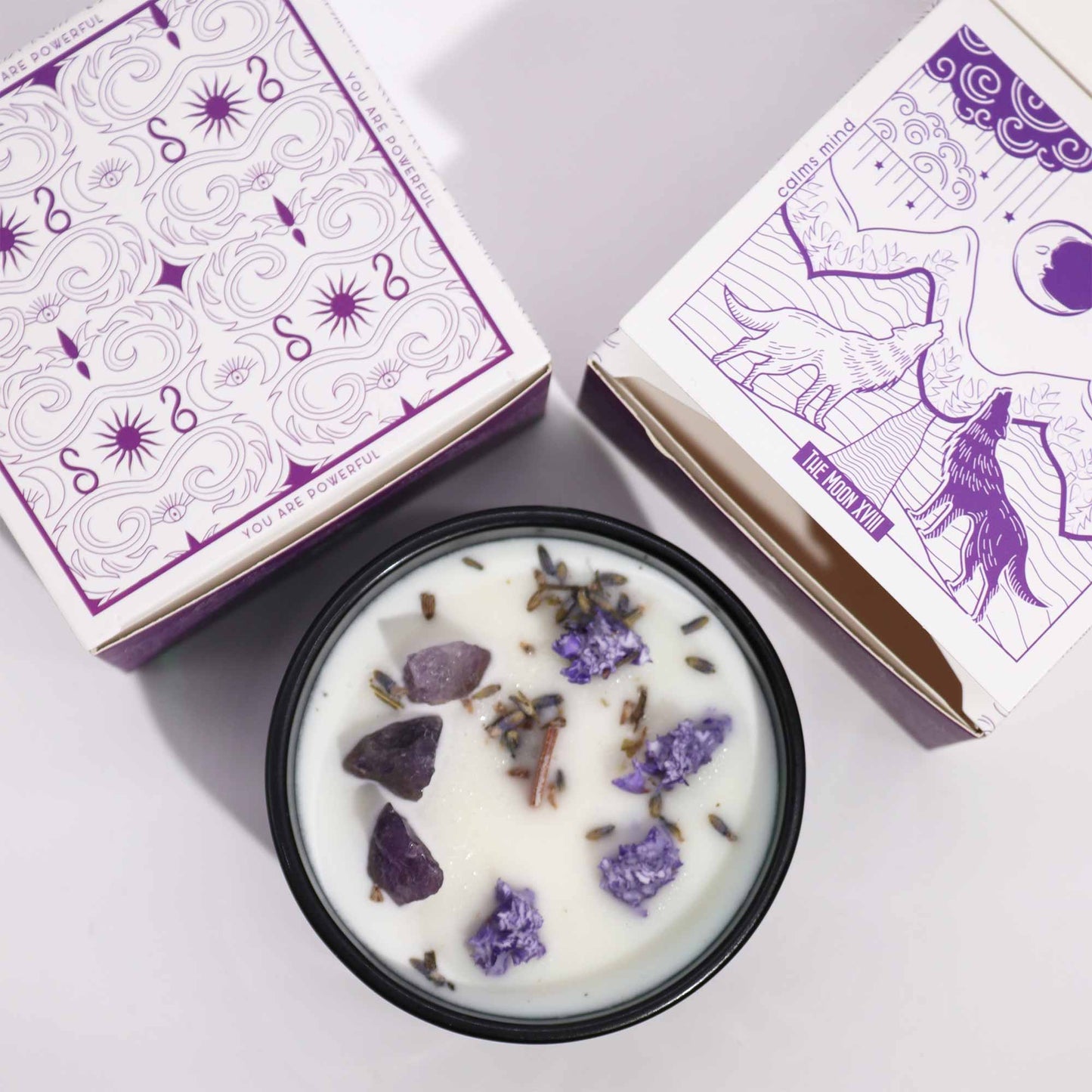 Hop Hare The Moon crystal candle with amethyst, lavender flowers, and tarot card in dark green jar
