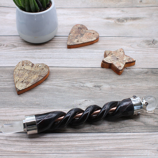 Spiral-carved healing wand with copper core, rock quartz point and sphere, gemstones, and wooden handle. Designed for clarity, energy flow, and healing.