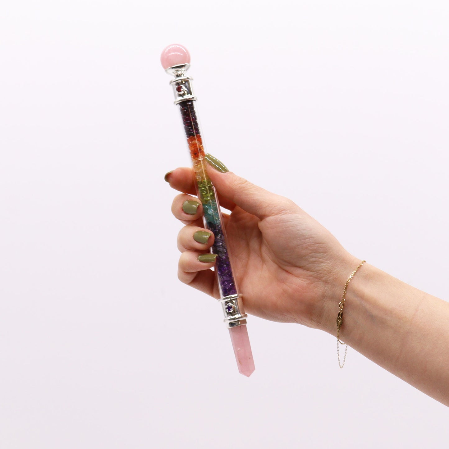 7 chakra crystal healing wand filled with rainbow gemstone chips, featuring a rose quartz point and rounded rose quartz end for energy balancing and heart healing.