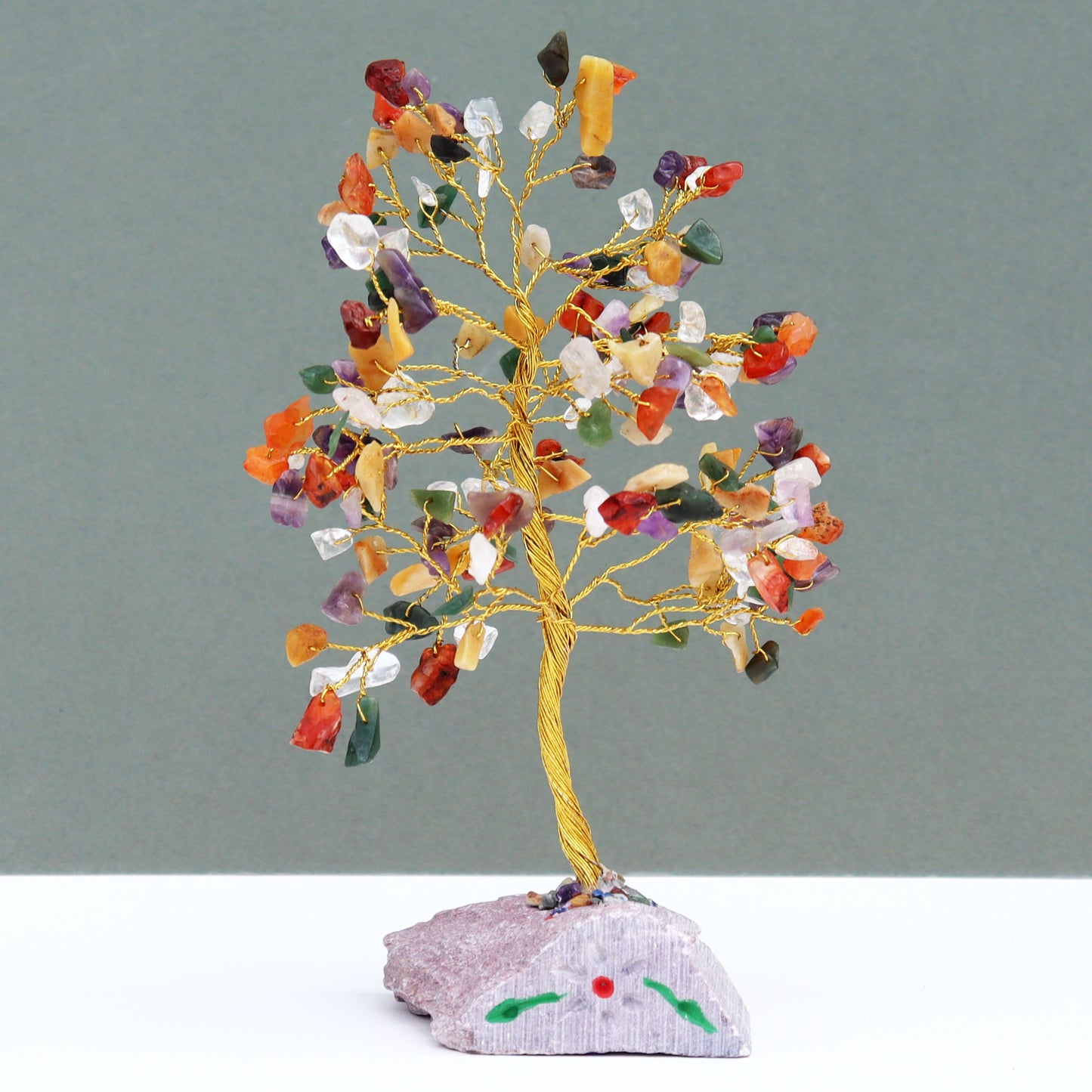 Mixed crystal tree with hand-carved stone base