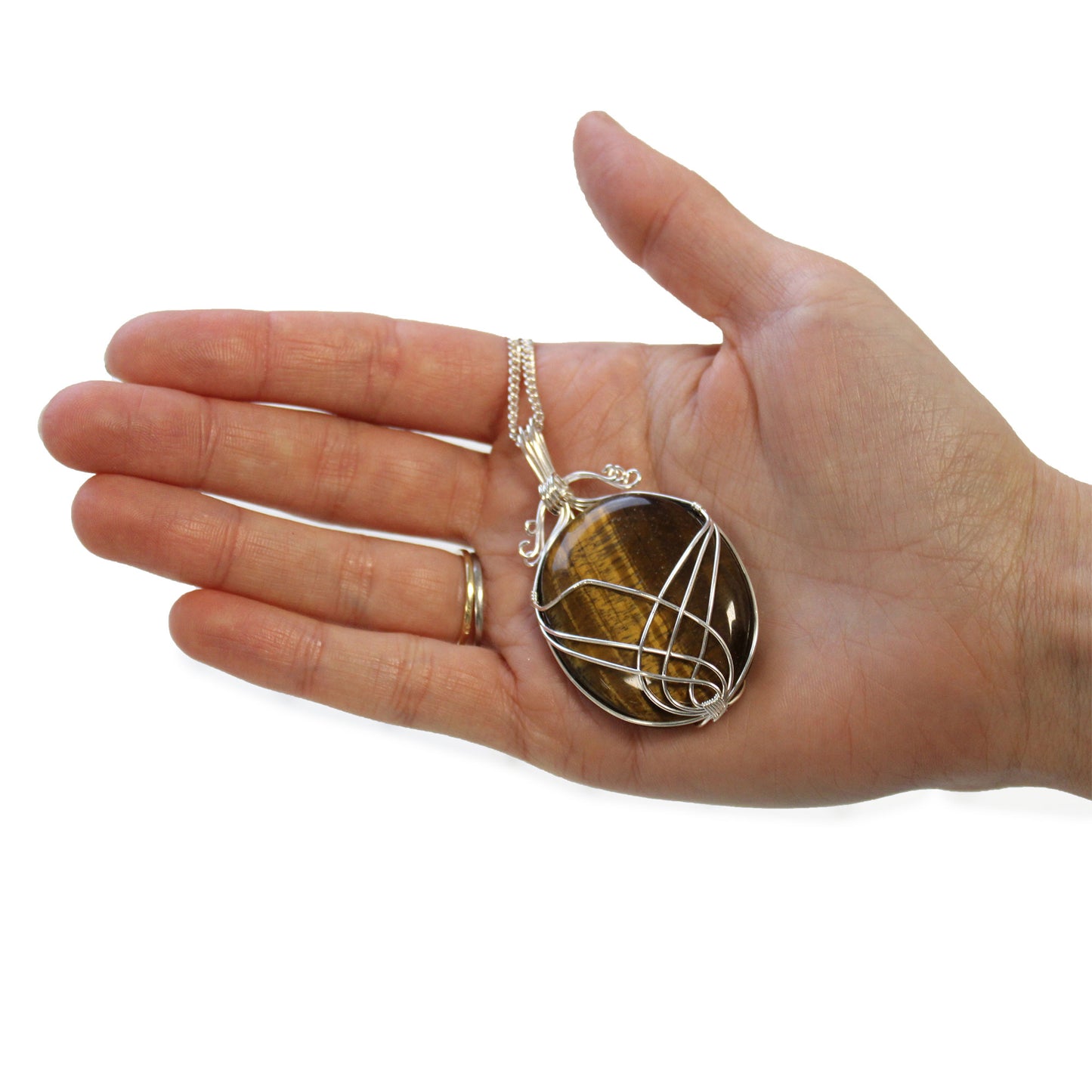 Oval Tiger's Eye gemstone necklace with silver swirl wire wrap on a 50cm silver-plated chain.