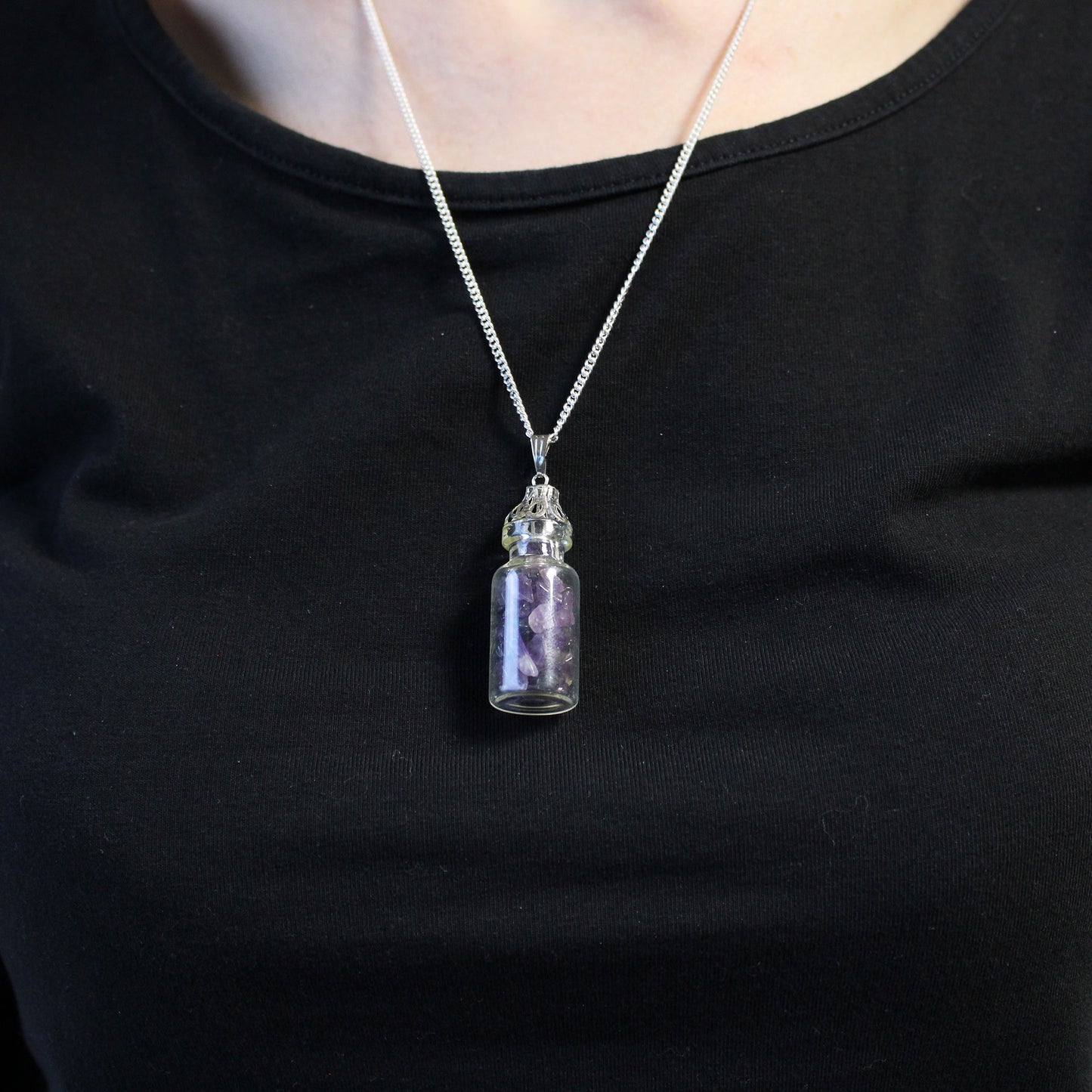 "Mini bottle necklace filled with purple amethyst chips, on a silver-plated chain"