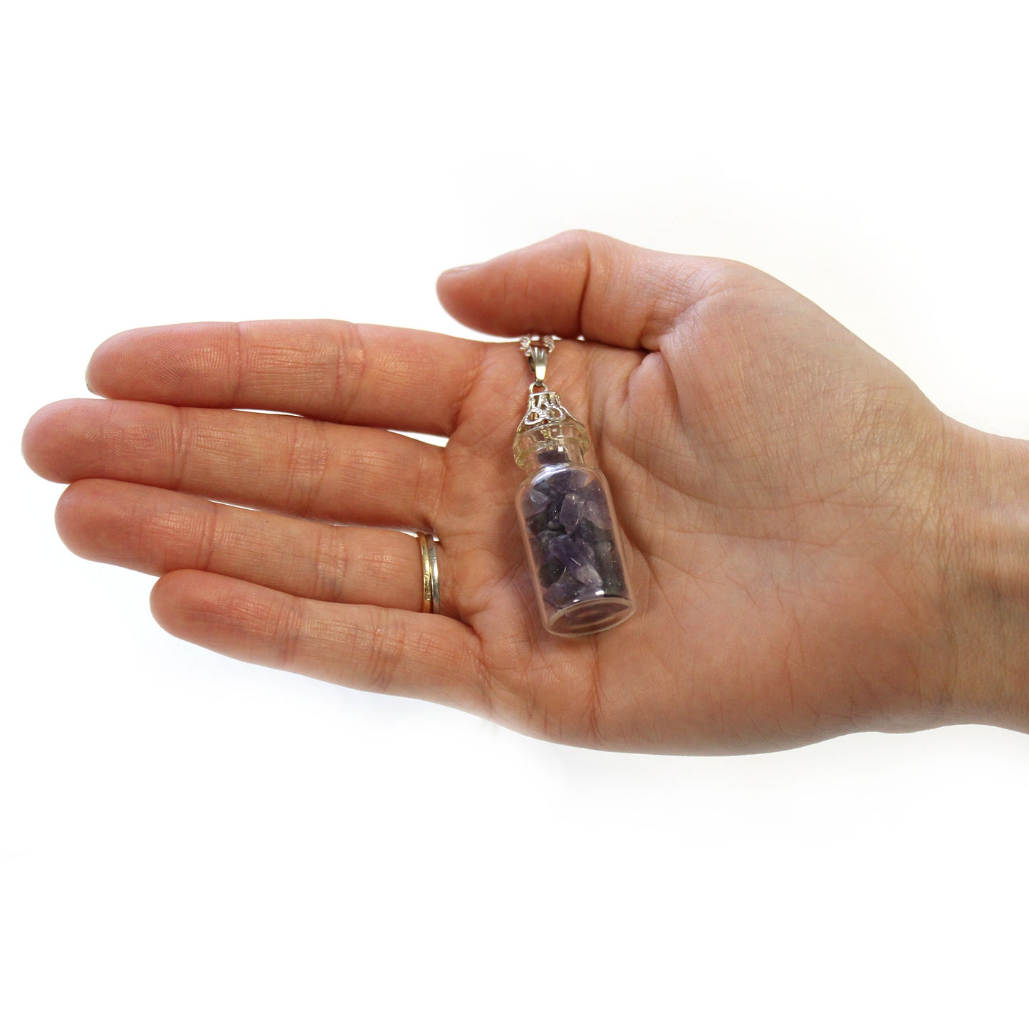 "Mini bottle necklace filled with purple amethyst chips, on a silver-plated chain"