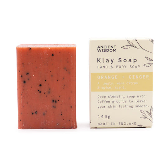 Natural clay soap bar with orange, ginger, yellow clay, and coffee – exfoliating and energising skincare.