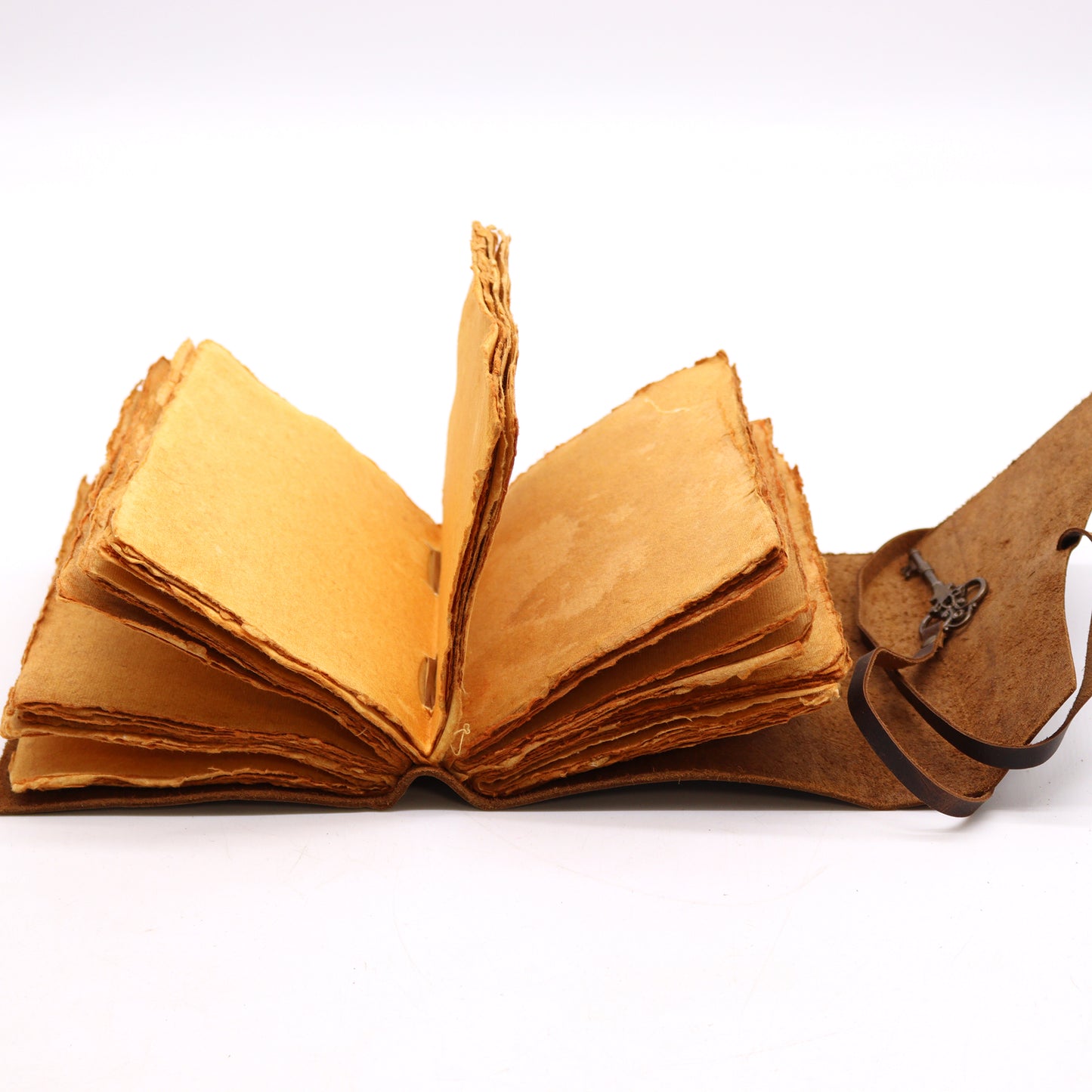 Oiled leather journal with vintage key and deckle pages