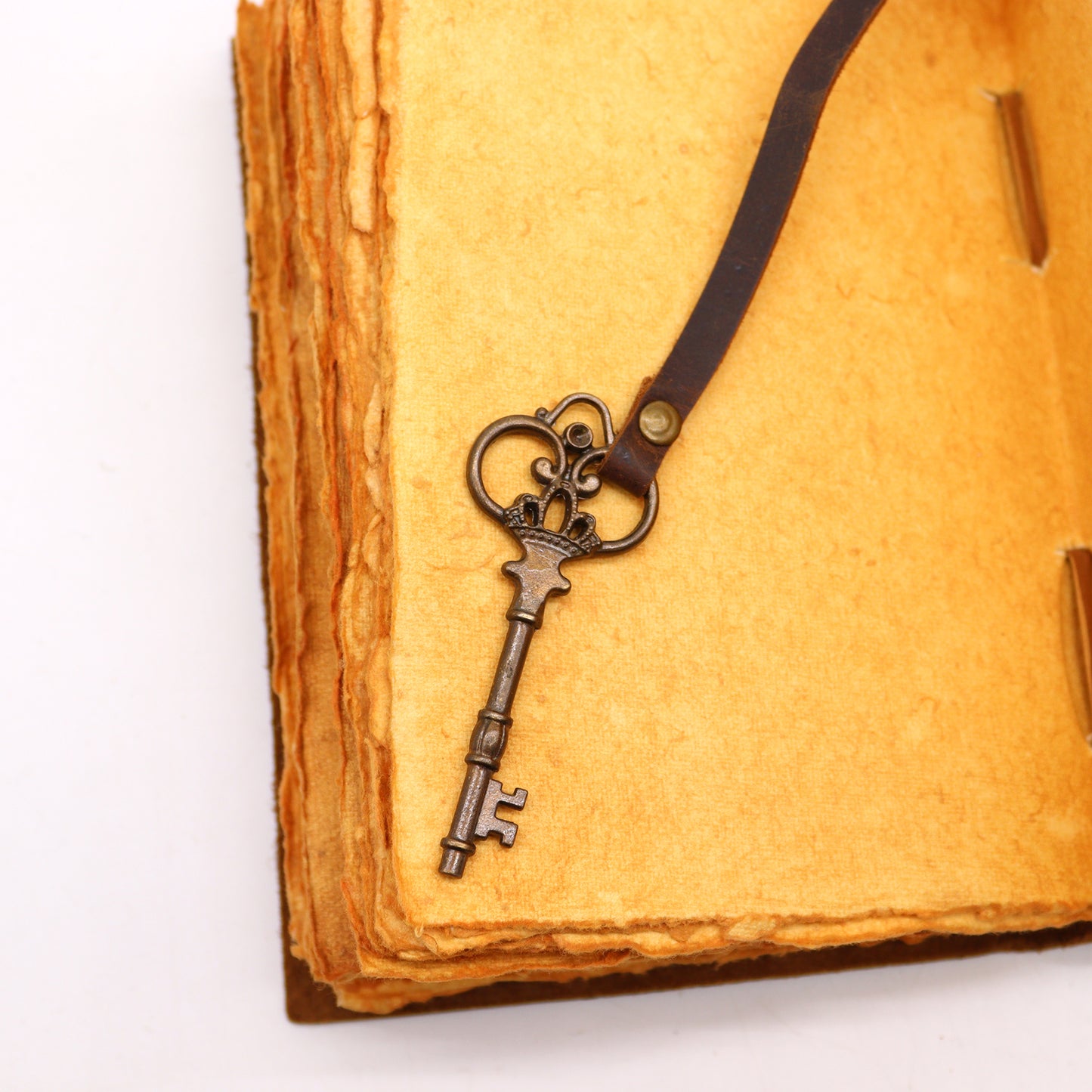 Oiled leather journal with vintage key and deckle pages