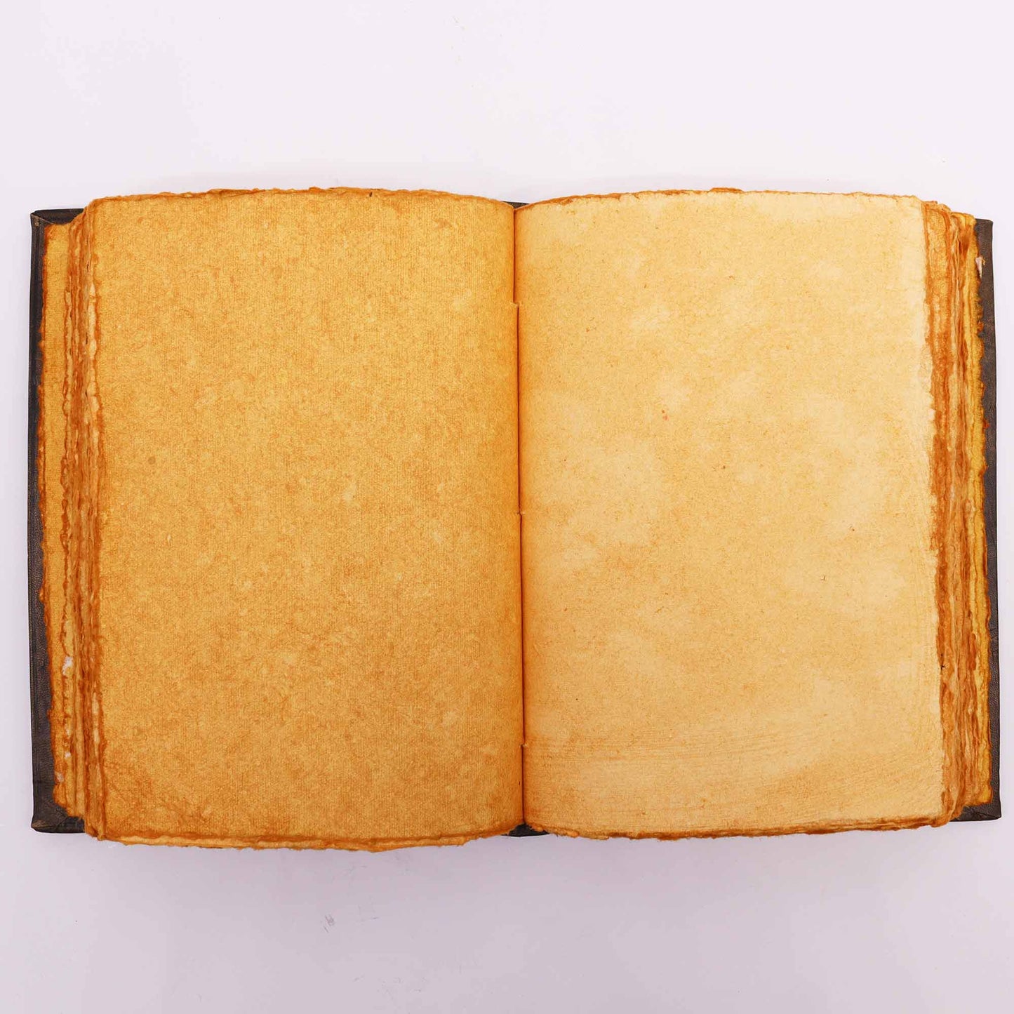 Leatherbound journal with triple moon zinc symbol and embossed corners – 200 deckle-edge pages.