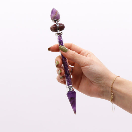 Shiva Lingam wand with amethyst crystal chips, polished ends, and sacred stones for enhancing intuition, peace, and higher awareness.