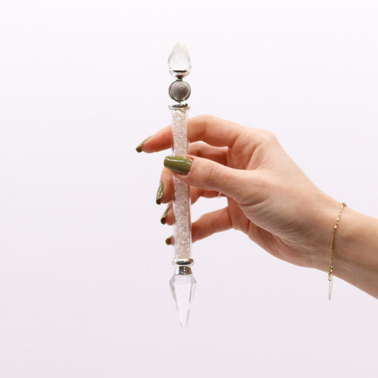 Shiva Lingam wand with rock quartz chips and polished crystal ends, designed for energy amplification and spiritual clarity during meditation or rituals.
