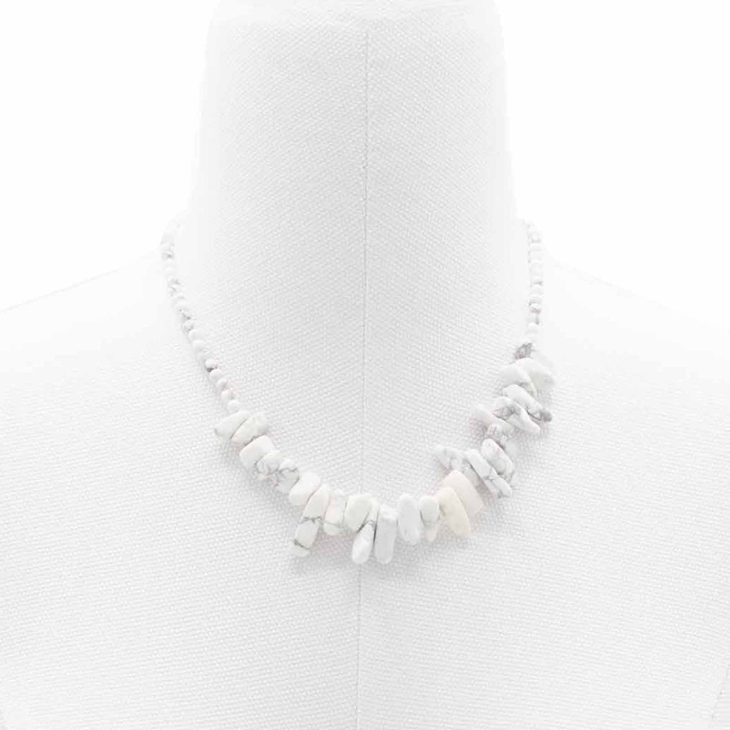 "Longstone Gem Necklace with natural white jasper gemstone chips and round beads, displayed on a white bust."