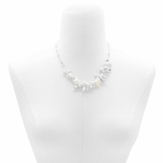 "Longstone Gem Necklace with natural white jasper gemstone chips and round beads, displayed on a white bust."