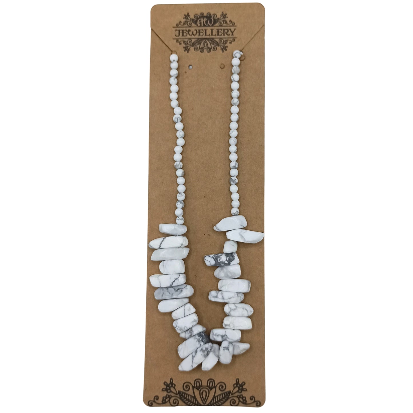 "Longstone Gem Necklace with natural white jasper gemstone chips and round beads, displayed on brown card backer."