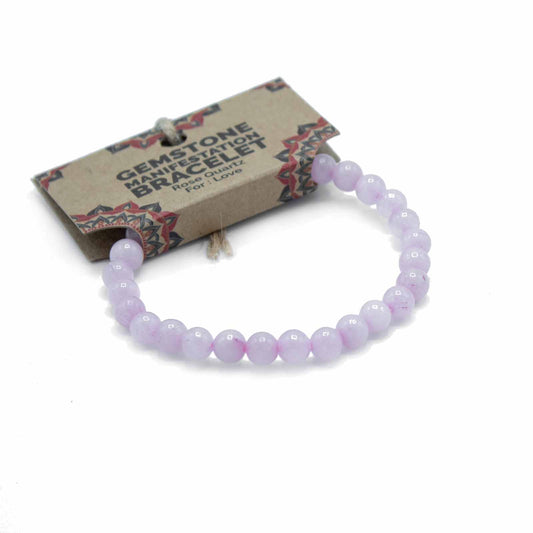 Rose Quartz gemstone manifestation bracelet with soft pink beads, symbolising love, emotional healing, and compassion.