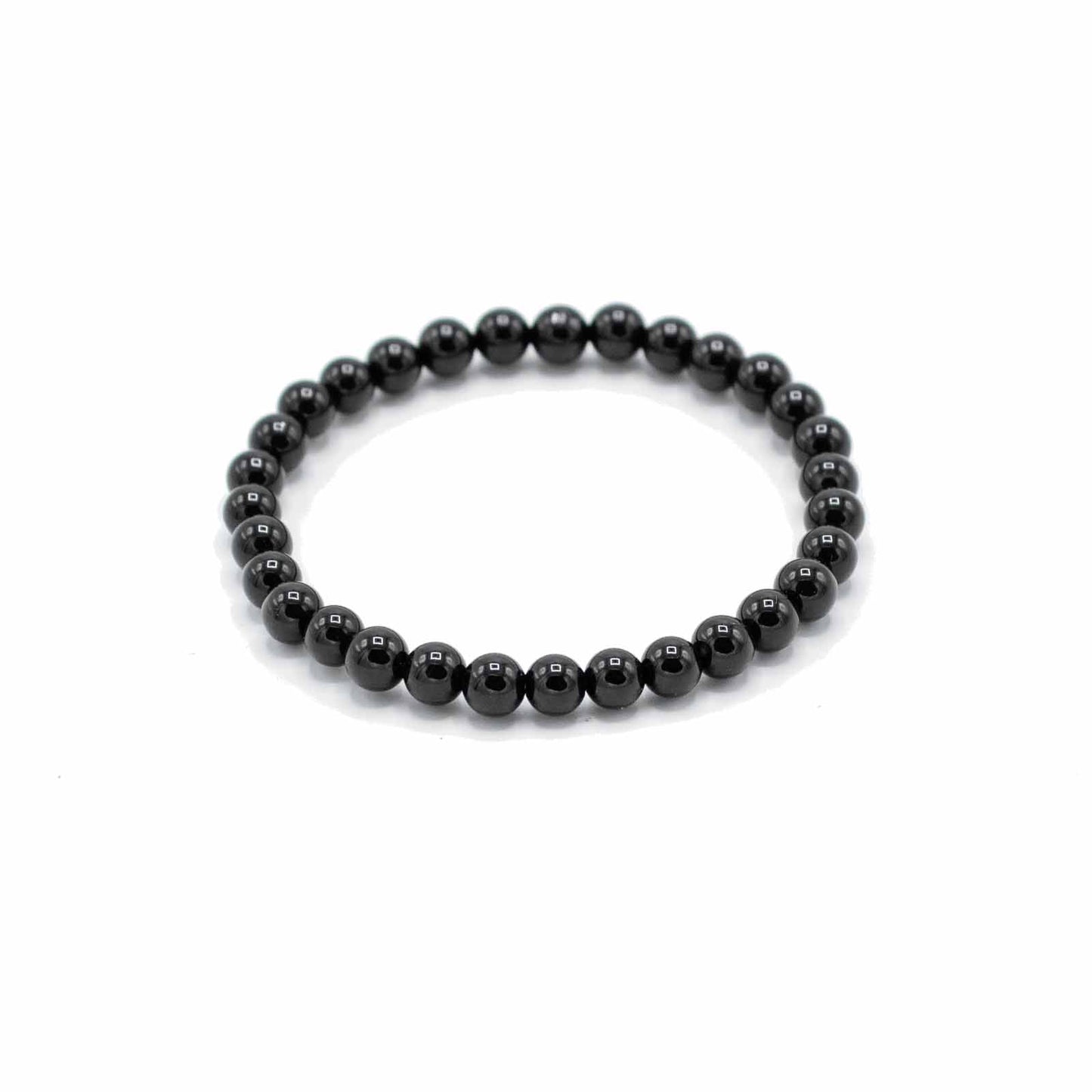 Black Agate gemstone manifestation bracelet with deep polished beads, symbolising protection, strength, and emotional grounding.