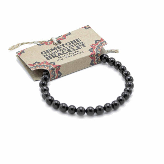 Black Agate gemstone manifestation bracelet with deep polished beads, symbolising protection, strength, and emotional grounding.