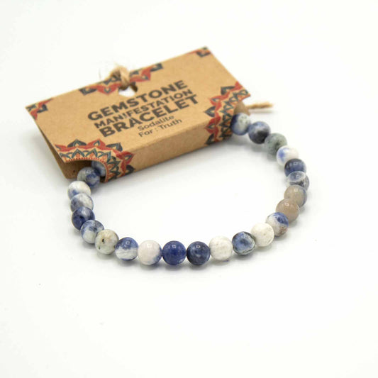 Sodalite gemstone manifestation bracelet with deep blue marbled beads, symbolising truth, clarity, and authentic communication.