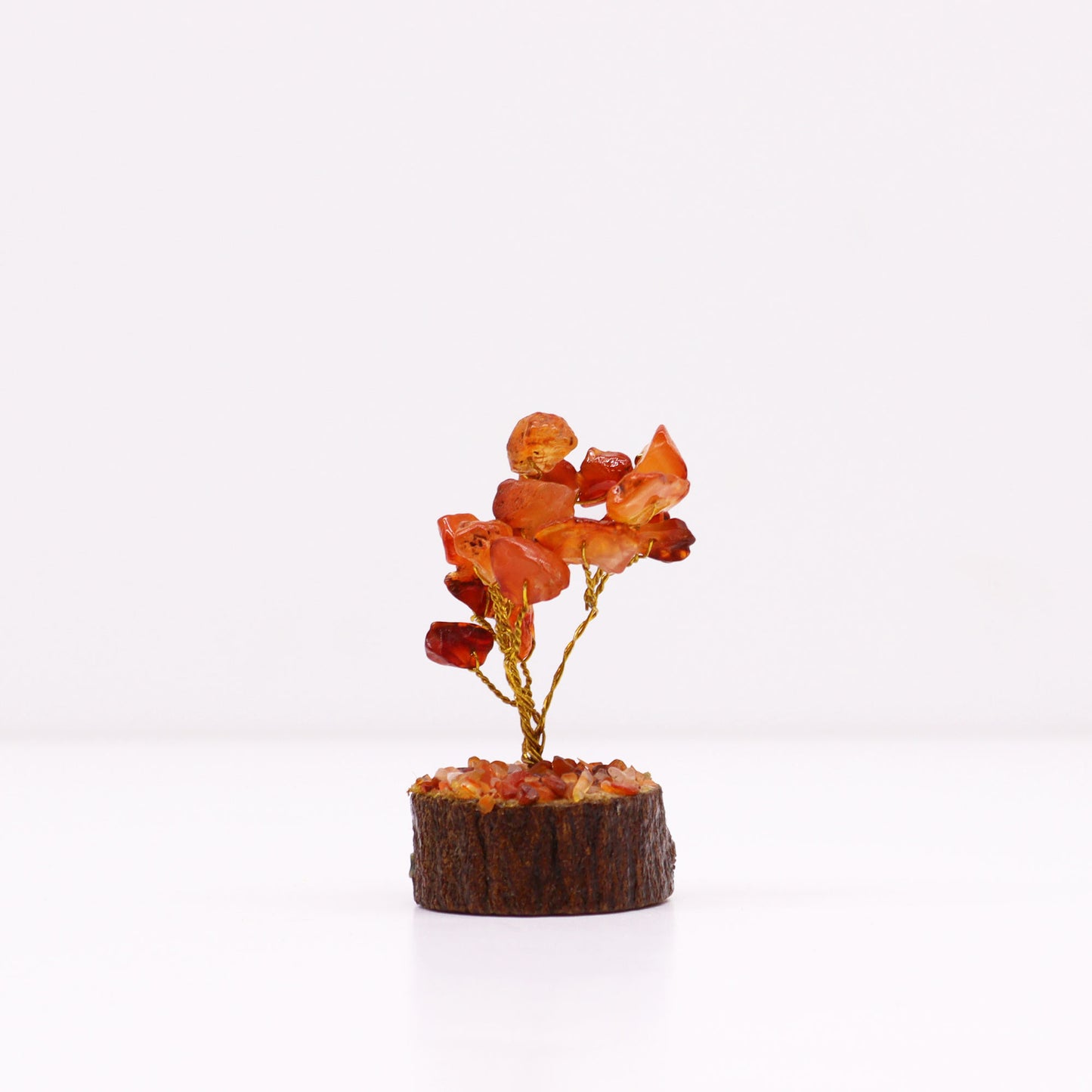 Mini Carnelian crystal tree on natural wood base – 6cm high with 15 healing crystals